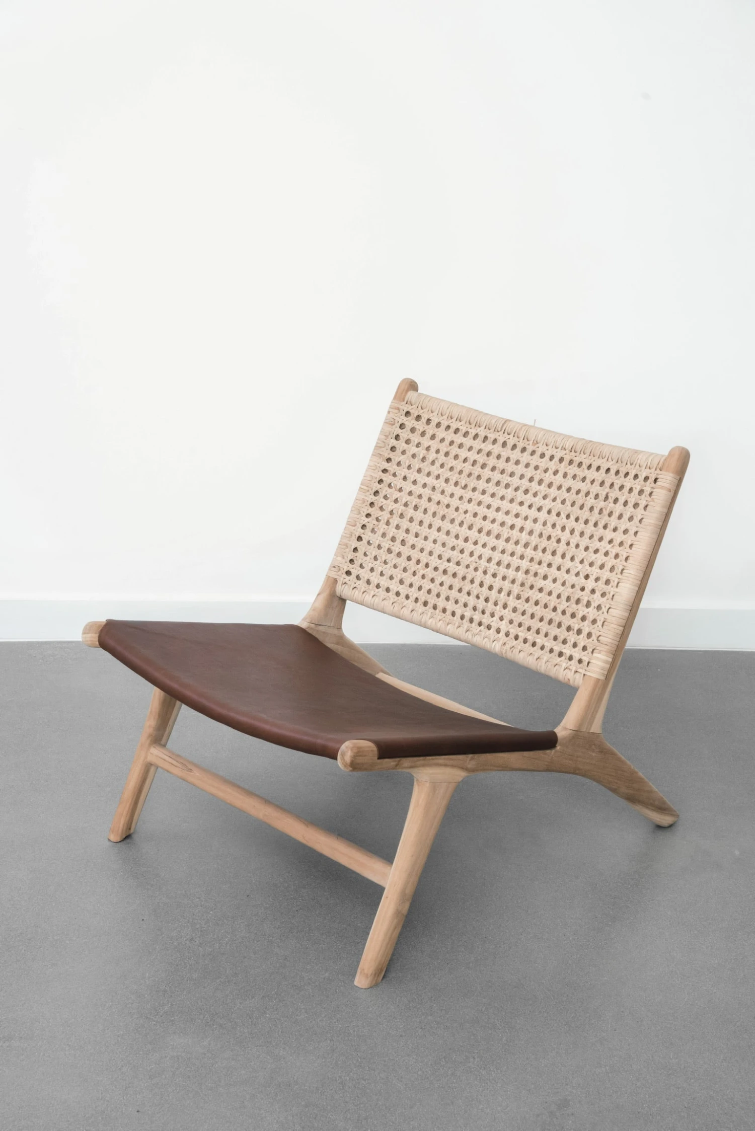 Leather And Rattan Lounge Chair - Second Quality 1 Leather And Rattan Lounge Chair - Second Quality