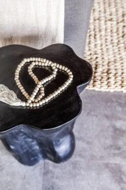 Tasseled Wooden Bali Beads -Saffron + Poe Tassled wooden bali beads styled on table