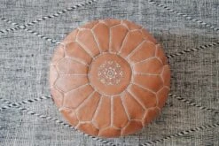 Embroidered Moroccan Leather Pouf - Second Quality 11 Embroidered Moroccan Leather Pouf - Second Quality -Saffron + Poe Top close up centered Embroidered Leather Moroccan Pouf 3